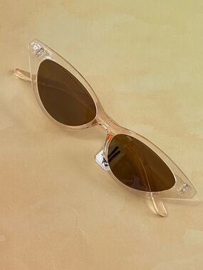 Free People Transparent Tea Slim Retro Cat-Eye Sunglasses with brown lenses